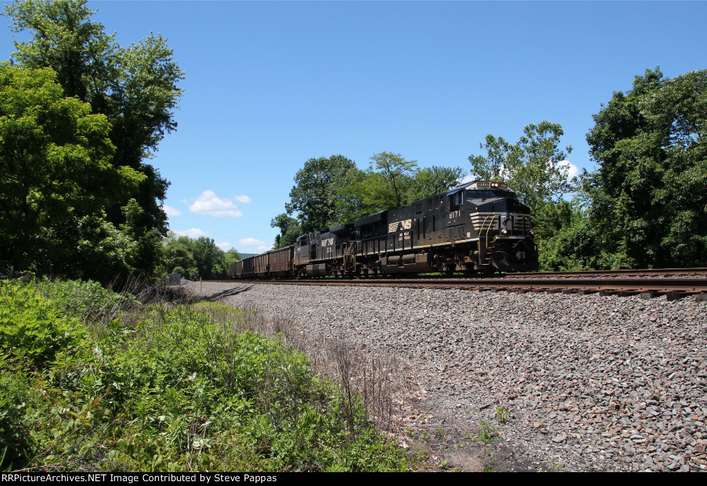 NS 8171 leading train 590 with coal loads through Cove PA
